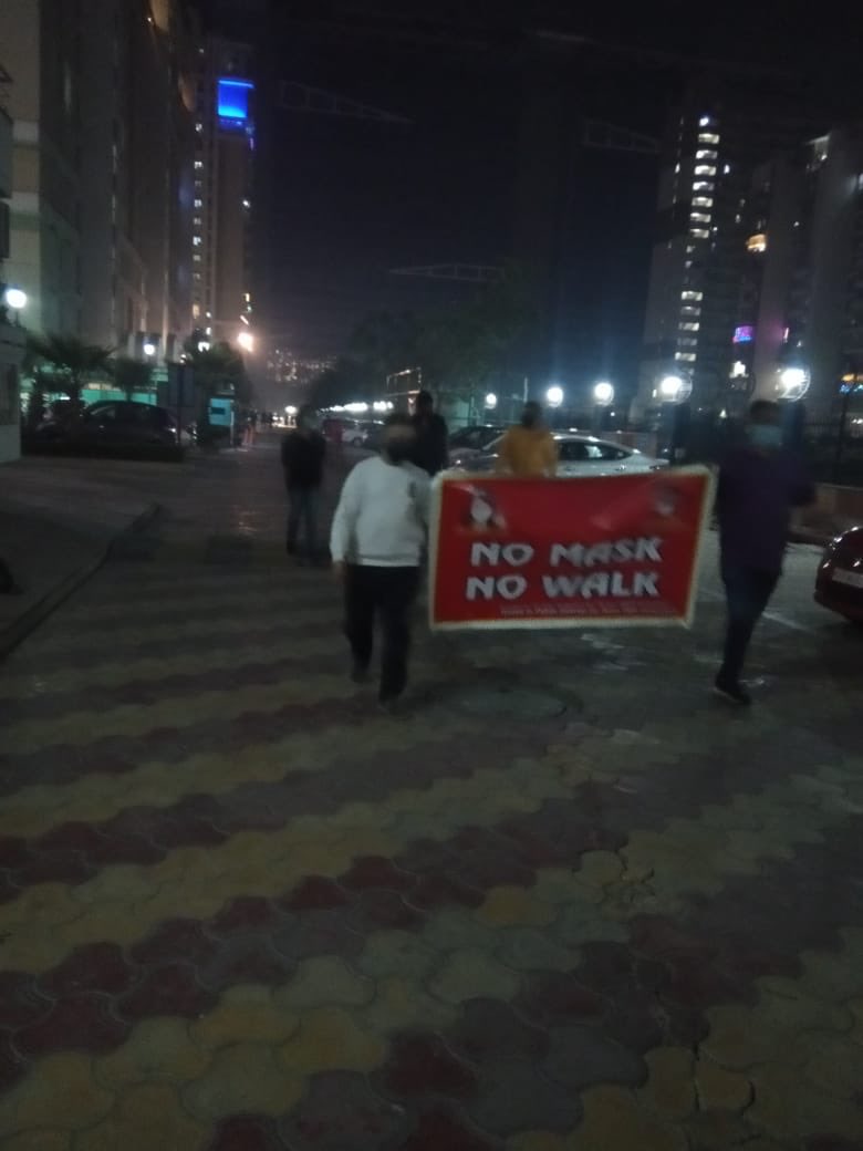 AOAPRP's tweet photo. With 50 active cases Team PRP and its volunteers took to the walkway of the complex with a banner to educate PRP citizens about the importance of wearing masks https://t.co/dhtigSZ5uj