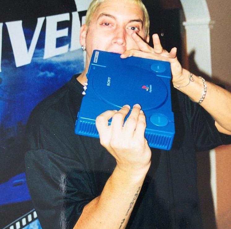 ShadyTimes's tweet photo. Since Playstation 5 is available globally today, here are some throwback pics of Eminem playing a special edition of a rare Blue PS1 🔥🔥
Like and Retweet this tweet and see what happens btw 👀

#PS5 https://t.co/AlwbdqLJkC