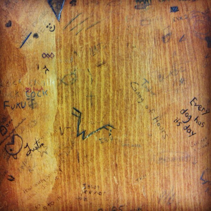 Number 28The magnificence of a decades old graffitied desk. "Every dog has its day"Social history.