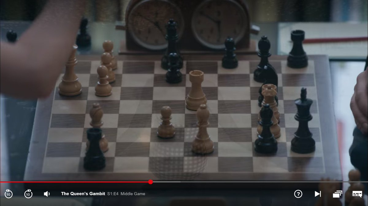 Beth calmly has a real obvious mate in two (Kh8 QxB#), and THIS is the time they have the actor playing Black calmly notate his move and start thinking?Also, her Bg2 is hanging, implying that she's been making a lot of forcing moves and he hasn't had the window to capture.