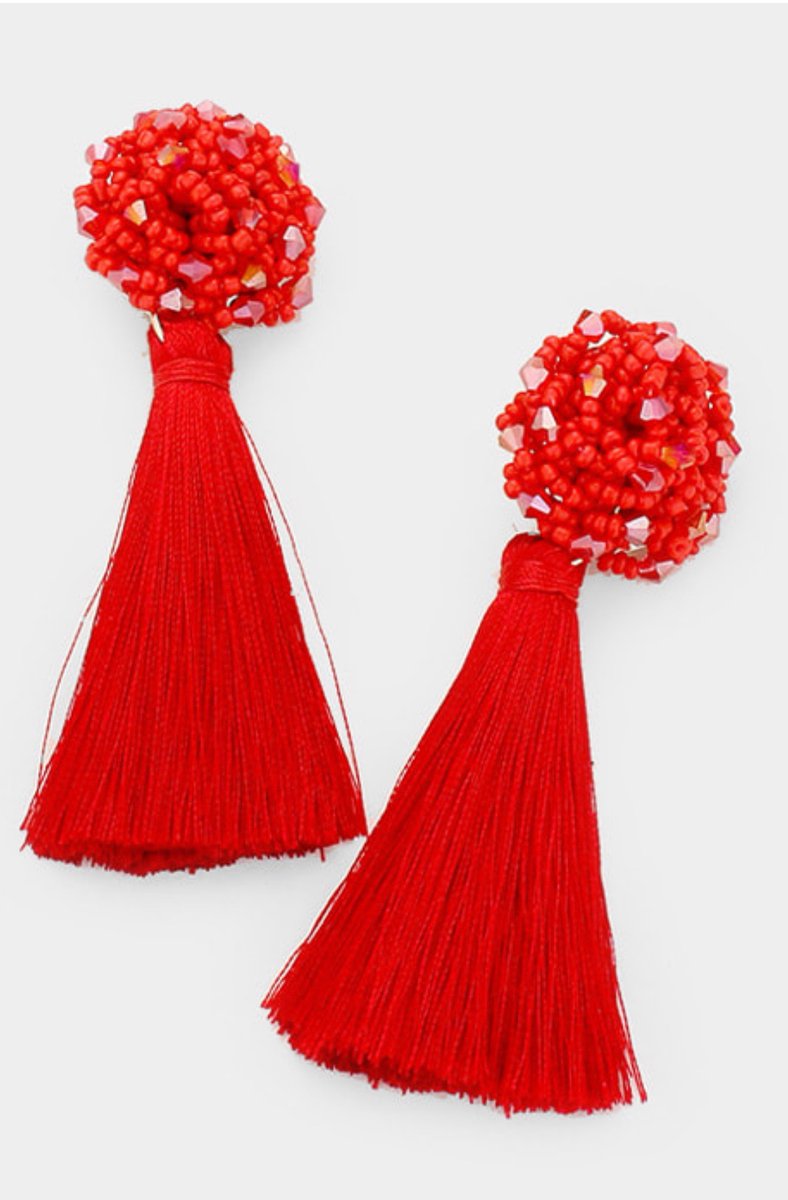 Red beaded tassel earrings super cute for the holidays.

#glossydesign #tasselearrings #tasselearring #earrings #redearrings 

glossydesignonline.com