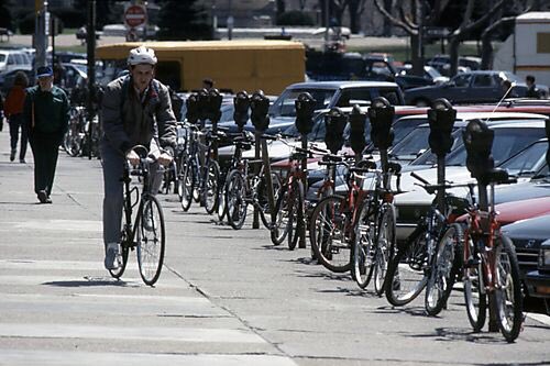 PghSmartCommute's tweet photo. This photo from Historic Pittsburgh was taken in the 90s of Bigelow Blvd in Oakland between the Student Union and the Cathedral of Learning. Now the street is closed off for what will soon be a more pedestrian and bike friendly corridor. Are you excited for Bigelow’s opening? https://t.co/MbMmGn625e