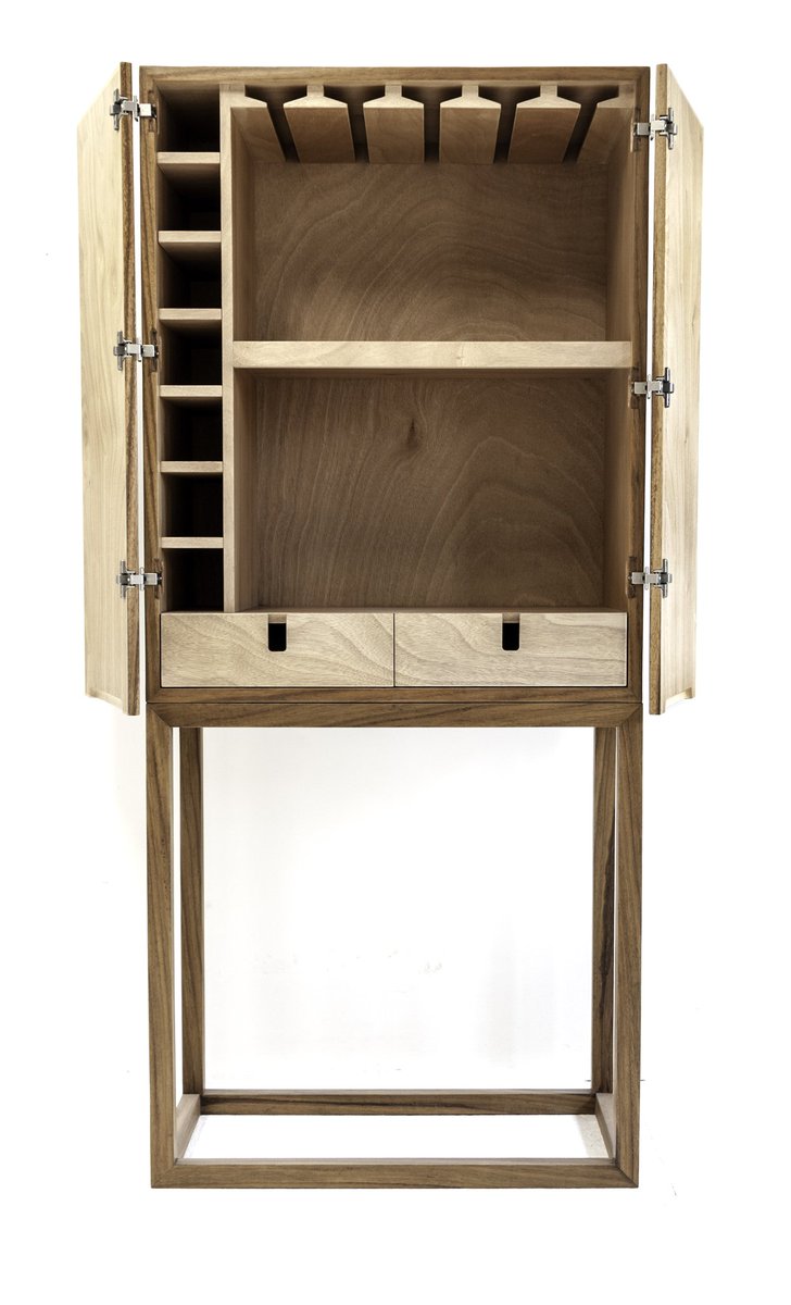 estudio_negro's tweet photo. El #arte genera vida en tus espacios. Solución de diseño: aplicación de arte en mobiliario.  Ropero-Bar hecho en #madera de parota con acabados naturales.
#EstudioNegro #DiseñoInterior #DiseñoyArte https://t.co/sAdYqeFVNG