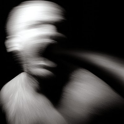 Suddenly you realize that everything within your field of view is actually a 42 million mile long object, a stretched out pole of gray matter, cyllindrically shaped as whatever you're looking at. You merely see the painted, textured end of it, its length hidden perfectly behind.