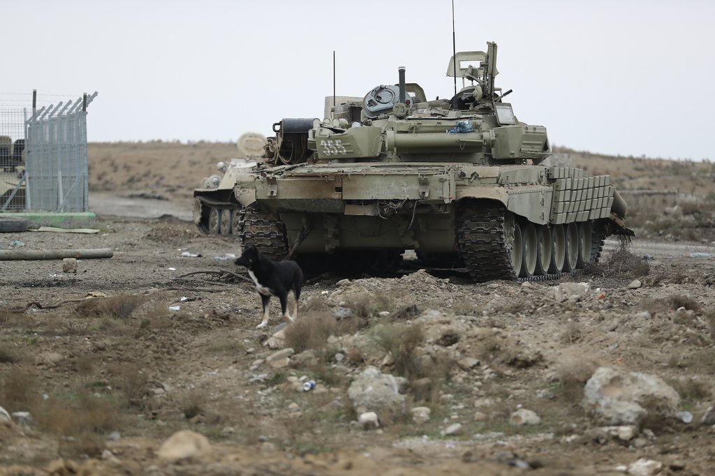 6. 6. Another pic of damaged Azeri T-72 Aslan #355 recovered by a BREM-1 from Meydan TV  https://d9mc3ts4czbpr.cloudfront.net/az/article/oldurulmus-seher-fuzuli/?ref=list-news. Again the Joint GPS/Comet IMU rail appears missing - possibly a T-72AV brought to Aslan standard? Same MT-LB with Zastava M55 AA gun and a further MT-LB in background.