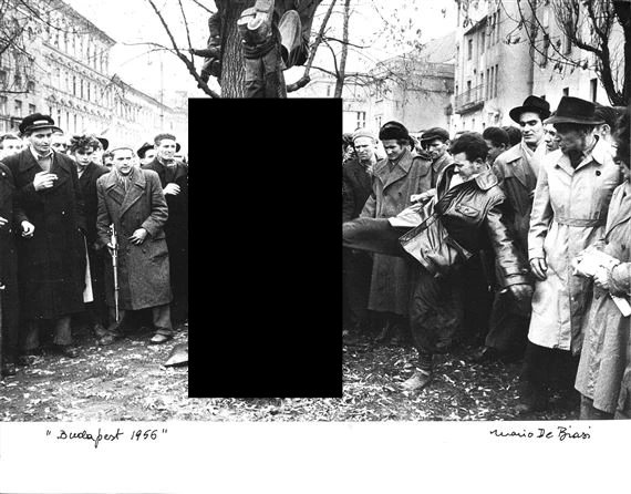 The "peaceful" demonstrators lynching a police officer.  Do a google image search if you want to see the uncensored image.