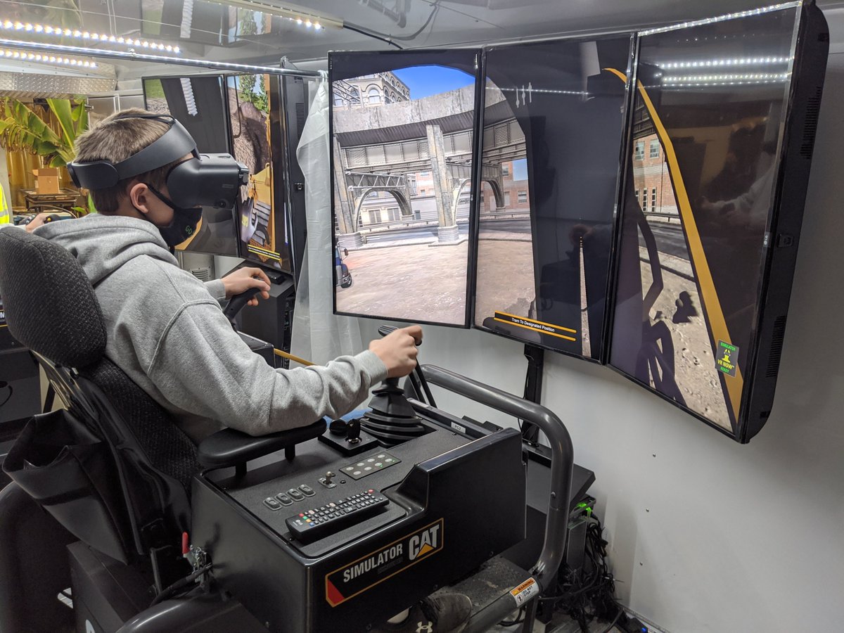 OsageFFA's tweet photo. This Construction Equipment Operator Mobile Simulator is an awesome experience! Over 35 students from Osage &amp; Riceville schools got the chance to "use" a bulldozer or excavator. A huge thank you to @iowa_insider  and @NEiowaCC  for coordinating this opportunity. https://t.co/Wbd2u75Vbj