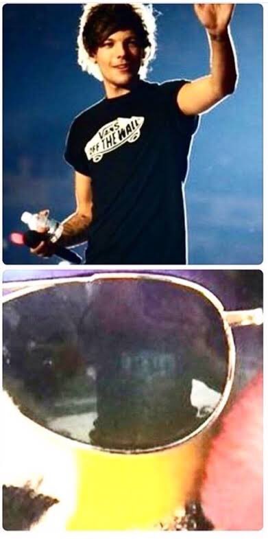 why was louis’ reflection seen in an image of the bears tweet? why did they take it down once people noticed his reflection? why did they blur the glasses from that day forth?