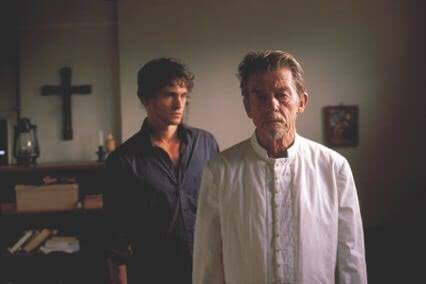 Joe Connor is a young teacher from England who does a year abroad in Rwanda at a local rural school, as a way of “giving back” as he puts it further down the movie. He teaches children of all ages in this school which was founded by Father Christopher (John Hurt).