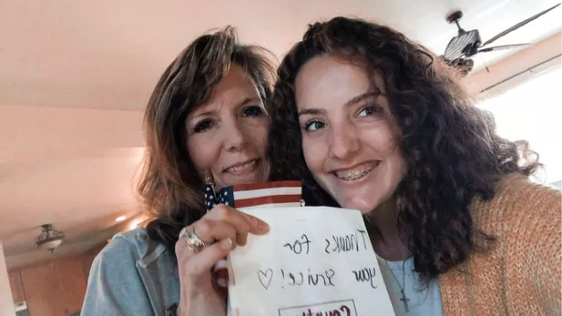 NhsCary's tweet photo. Cary-Grove NHS members made surprise home deliveries on Veterans Day to thank local veterans for their service to our country. It meant so much to us to be able to say "thank you" in person! 
@CaryGroveHS @kveldyCG @NeilLesinski #d155inspire #VeteransDay https://t.co/GQC3yzotua