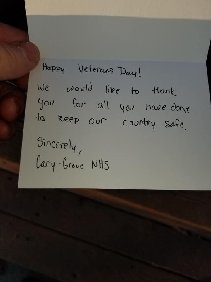 NhsCary's tweet photo. Cary-Grove NHS members made surprise home deliveries on Veterans Day to thank local veterans for their service to our country. It meant so much to us to be able to say "thank you" in person! 
@CaryGroveHS @kveldyCG @NeilLesinski #d155inspire #VeteransDay https://t.co/GQC3yzotua