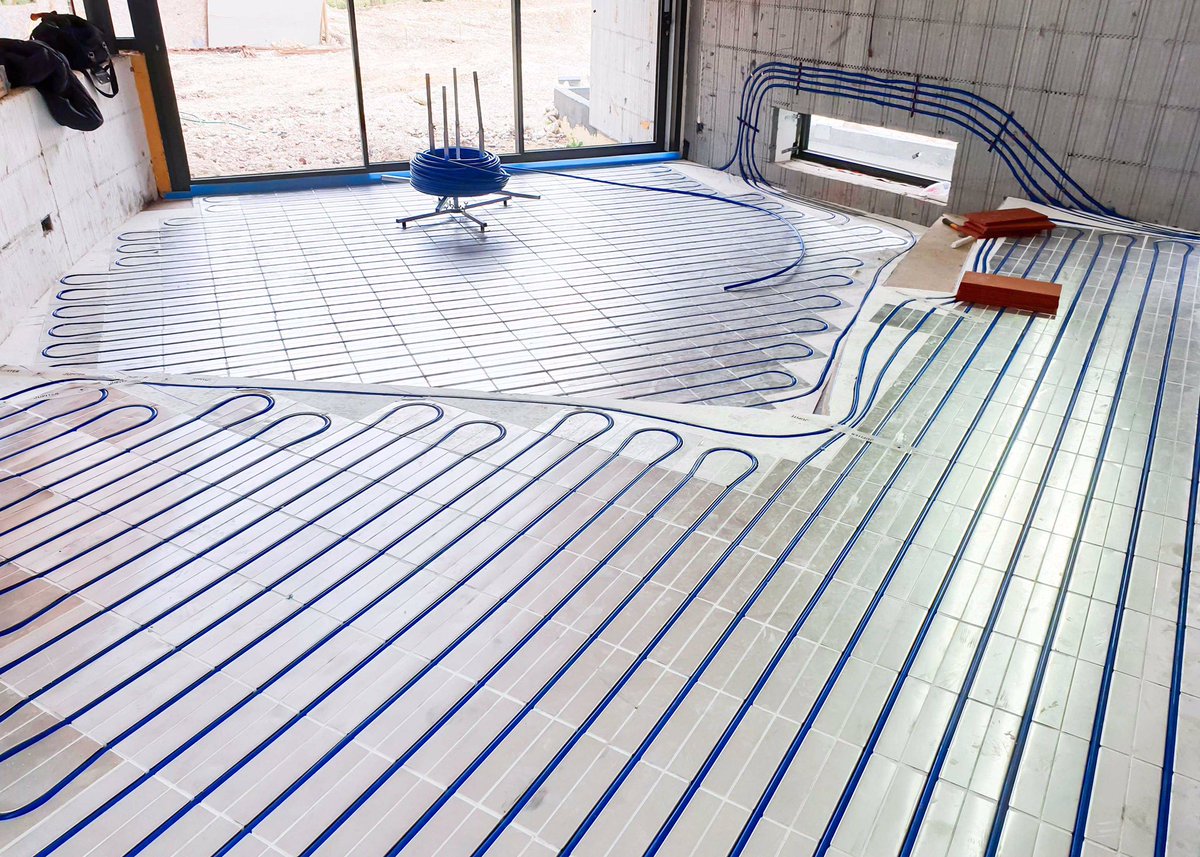 JupiterUFH's tweet photo. Complicated install over various levels and clever use of walls to run pipework between them. Seamless resin floor finish over the Jupiter Screed Replacement Tile System. Sheer perfection. #sphere8 #resinfloor #screedreplacementtile https://t.co/4GBgYYTt3d
