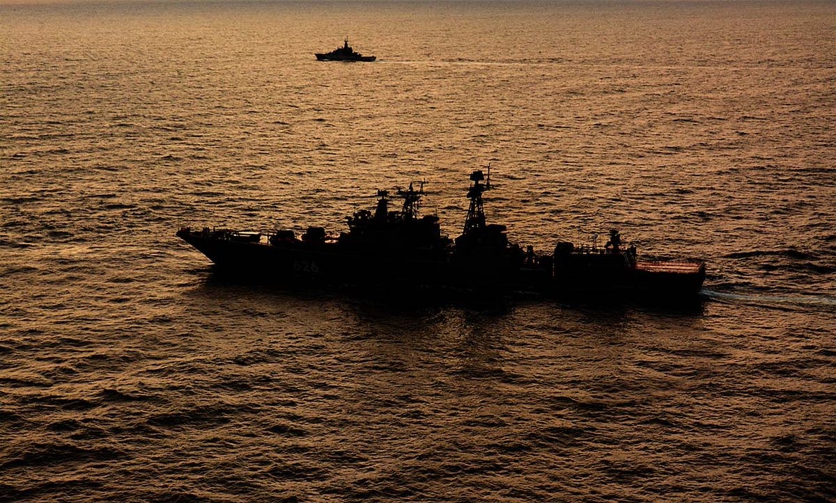 Vice Admiral Kulakov with HMS Tyne in the background