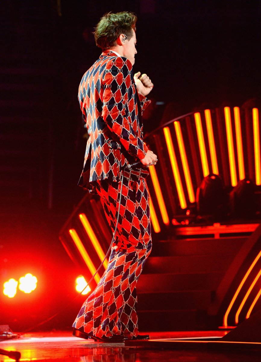 This harlequin patterned suit rivals any of Mick Jagger's. It's Gucci, because of course, it is!