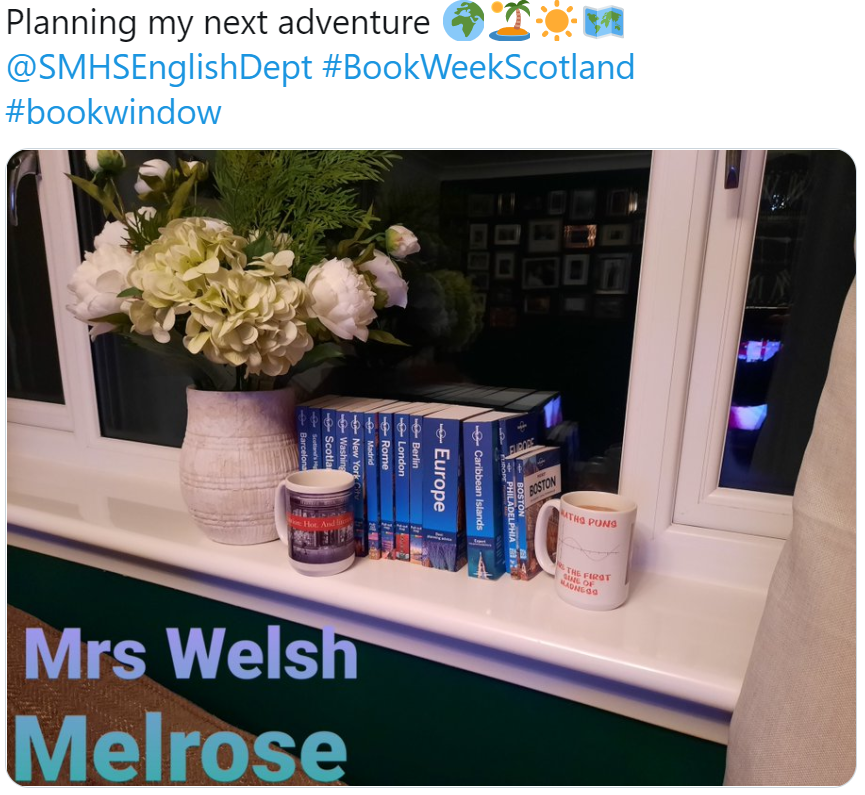 SMHSEnglishDept's tweet photo. @StMargaretsMath’s Mrs Welsh’s #BookWindow is what the kids would call “a mood”! 🌞🏖️Reading books is the next best thing to actual travel @MelroseStMags may sneak this yet! #BookWeekScotland  💛📚🏠🏆 https://t.co/XLqIQ9p1cW