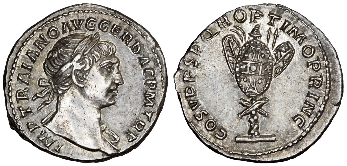 New coin: Roman silver denarius of Trajan minted around 107-108 AD, celebrating the victorious culmination of his Dacian Wars. The near mint state denarius depicts a Roman trophaeum; a victory trophy in the form of a tree stump decorated with captured enemy armour and weaponry.