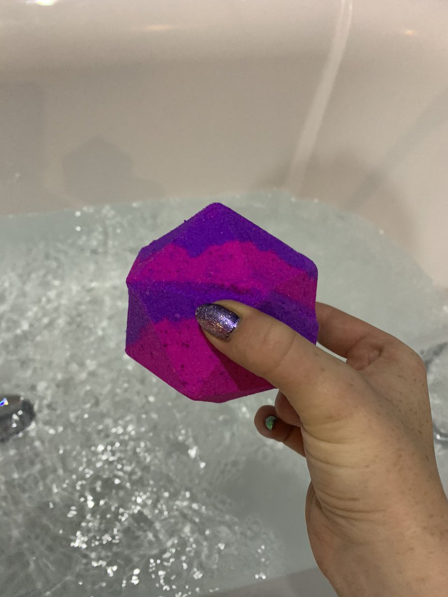 Amy_Everall's tweet photo. @GeekyClean I’m obsessed! Got this for my birthday as well as a pin. This was my first ever order! It’s so amazing! The dice are stunning, my new fave set, and the bath bomb smells amazing, didn’t stain me and left no residue for me to clean. Perfect! My cat approved! Thanks!💜😍 https://t.co/veKrYxaTHI