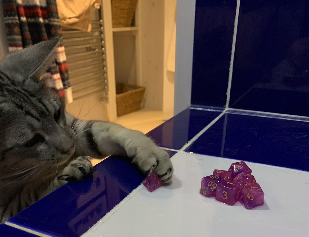 Amy_Everall's tweet photo. @GeekyClean I’m obsessed! Got this for my birthday as well as a pin. This was my first ever order! It’s so amazing! The dice are stunning, my new fave set, and the bath bomb smells amazing, didn’t stain me and left no residue for me to clean. Perfect! My cat approved! Thanks!💜😍 https://t.co/veKrYxaTHI