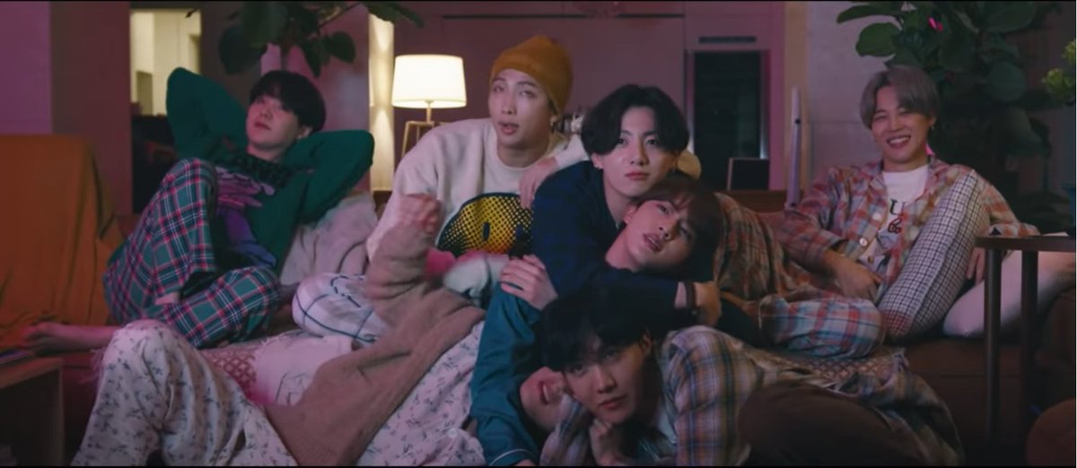 Back to the lounge room and they're all together again at night with Jin literally their centre of gravity and getting hugged from all ends.