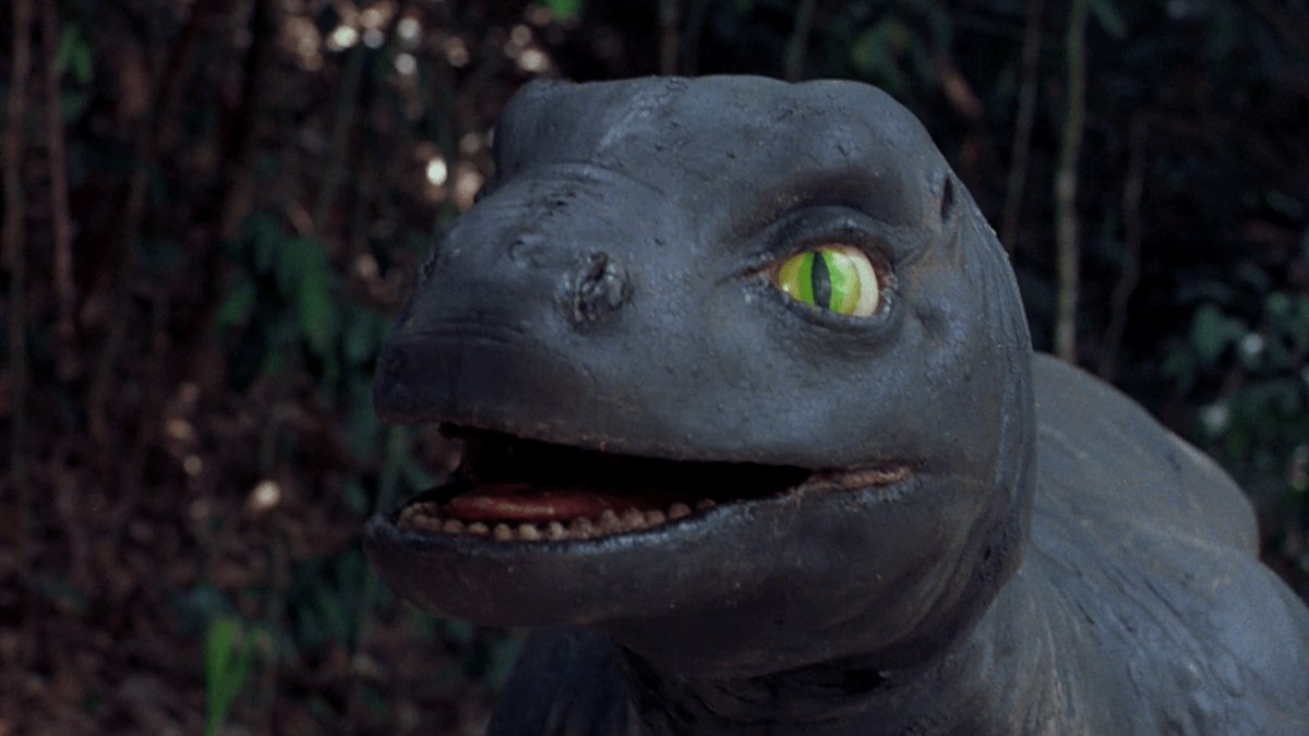 Certain choices were made by Raponi & co in designing the brontosaurs. They put the nostrils at the tip of the snout so it could sniff about. (At the time, it was believed bronto nostrils were on top of the head) The reptilian slit pupils were chosen to make it seem less like ET.