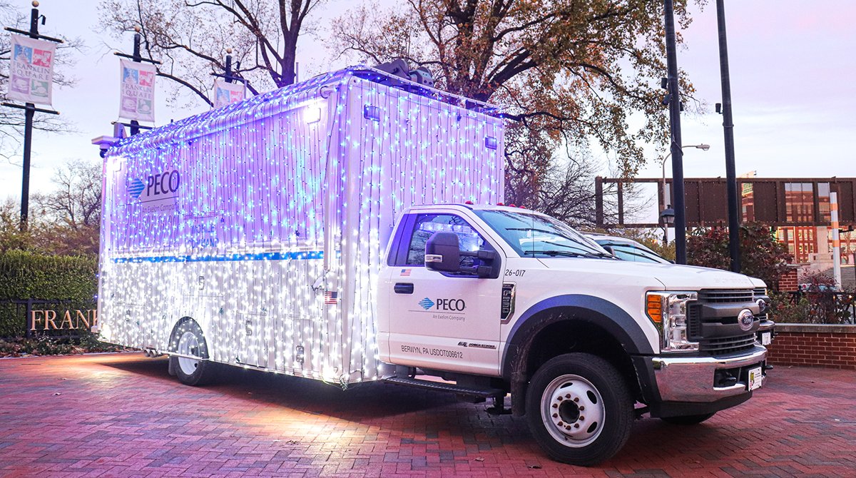 PECOconnect's tweet photo. Can we get a watt watt?! The #ElectricalSpectacle at @FranklinSqr is officially back with more lights than ever before.
Of course we had to show up in style — check out our PECO Mobile Command Center wrapped in LED lights! https://t.co/M1x450Dc6y