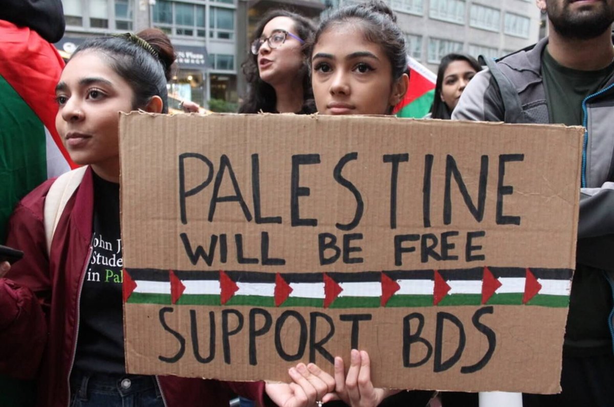 Mondoweiss's tweet photo. "With our many partners, we shall resist these McCarthyite attempts to intimidate and bully Palestinian, Israeli and international human rights defenders into accepting Israeli apartheid and settler-colonialism as fate." - @BDSmovement https://t.co/vqJpaDTc6F https://t.co/gJ70SI2yLL