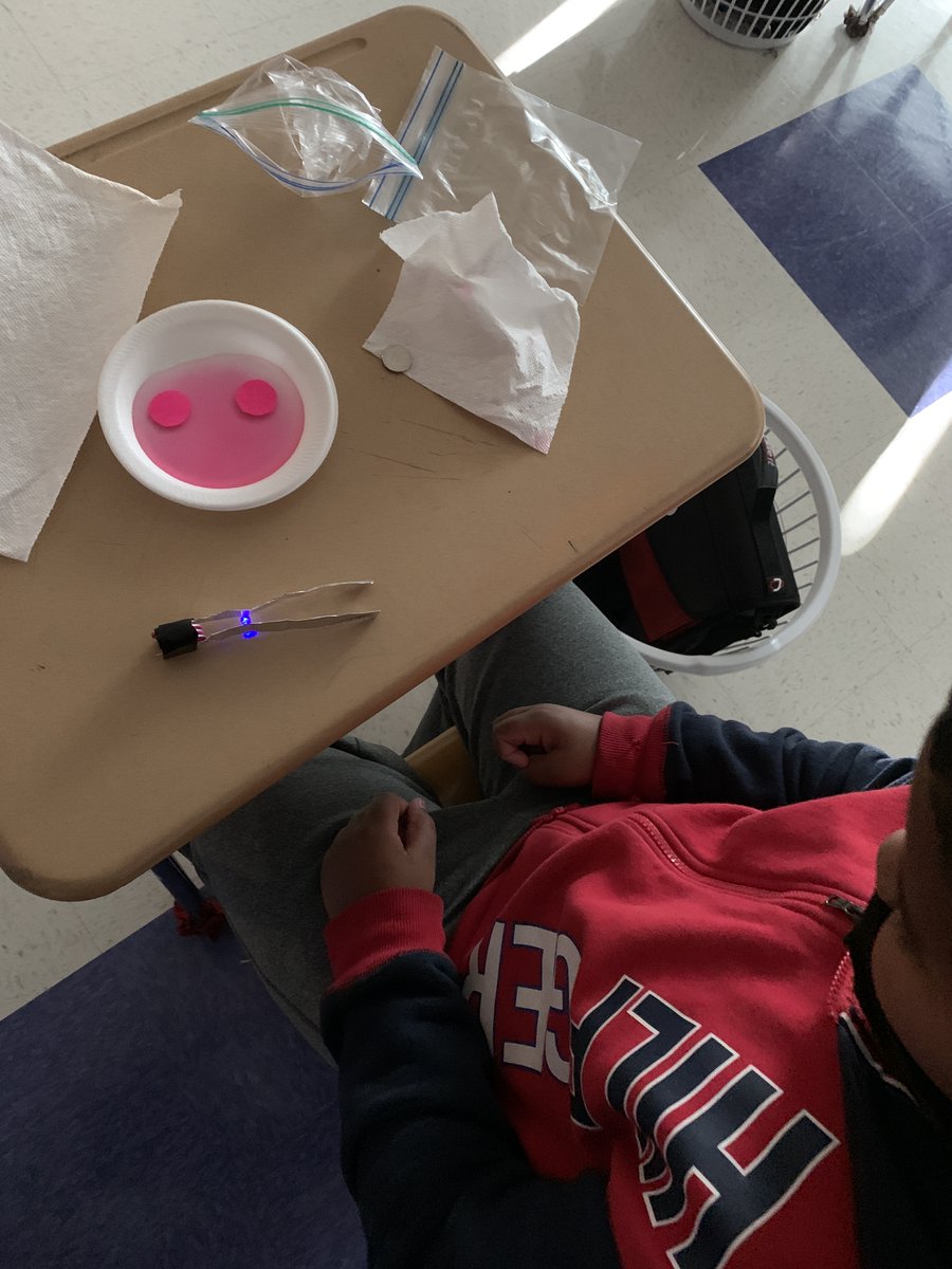 MMA_DLC's tweet photo. 4th Grade Scholars at MMA built their own battery to power a LED light with nickels, washers, and vinegar soaked paper.  Students learned about chemical reactions to create volts, and the flow of electrons in a circuits to supply energy.  
#ElectrifyingEngineering #amplifyecps https://t.co/rWsuWLGhX0