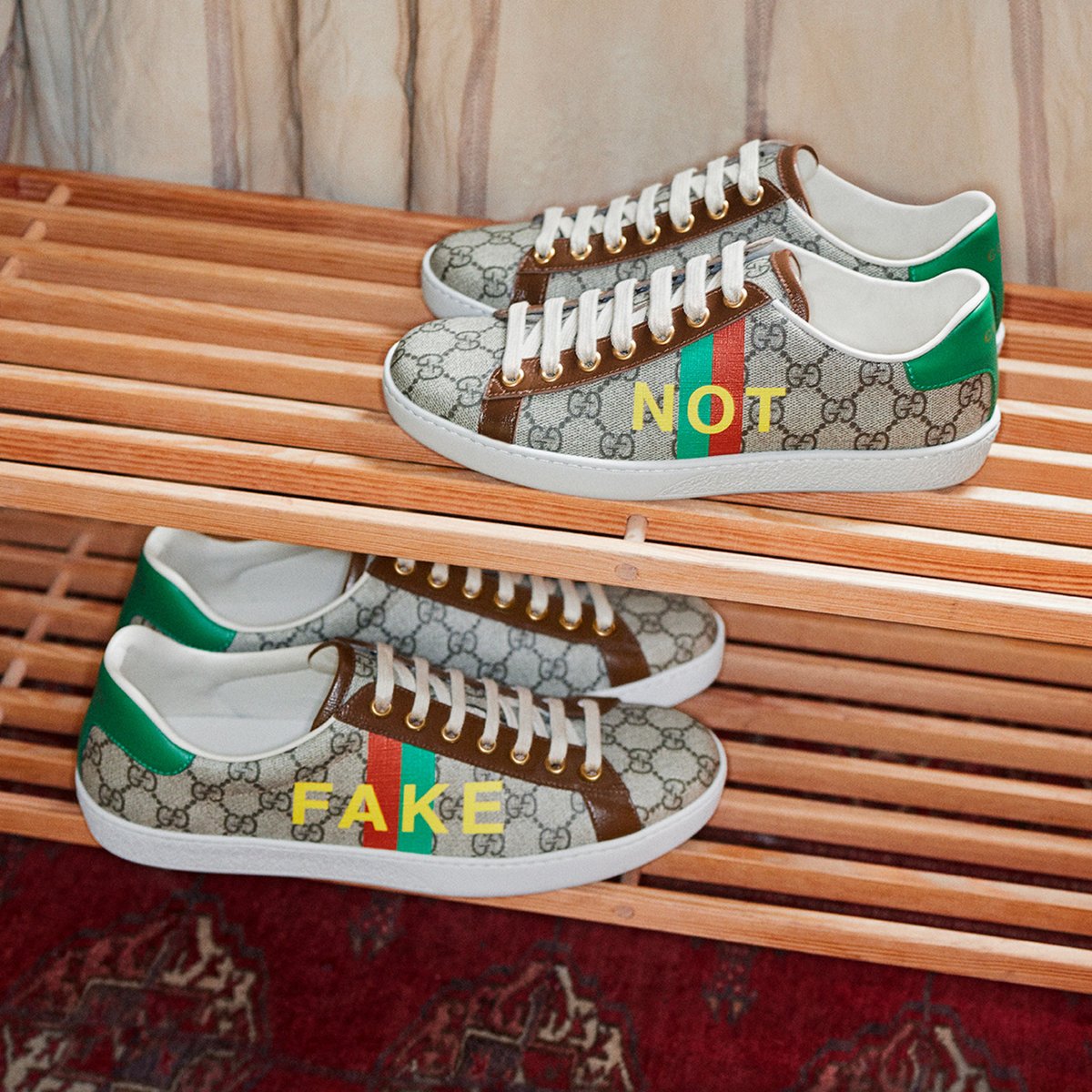 PlazaSenayan's tweet photo. #GucciAce sneakers feature an ironic wordplay bearing the word ‘Fake’ in capital letters against a reinterpretation of the green and red Web stripe with the word ‘Not’ on the other shoe. #GucciFakeNot https://t.co/Y5gmmq6JOn