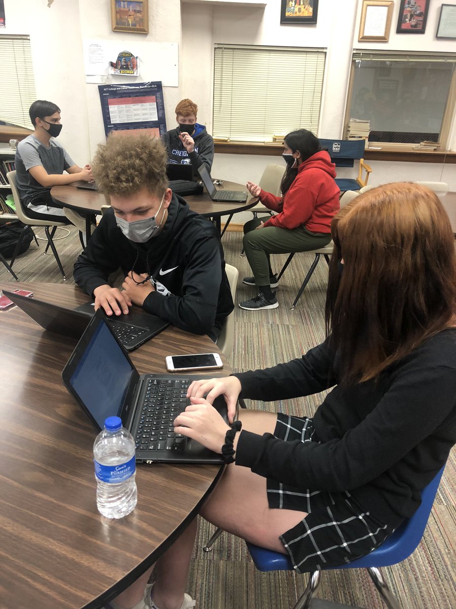 JOckander's tweet image. Scout nation can be proud of the juniors today who are working on logic and argumentation about school uniforms.  These two came up with Tinker vs. Des Moines as part of their justification.  #dcscouts #persuasion #droppingknowledge