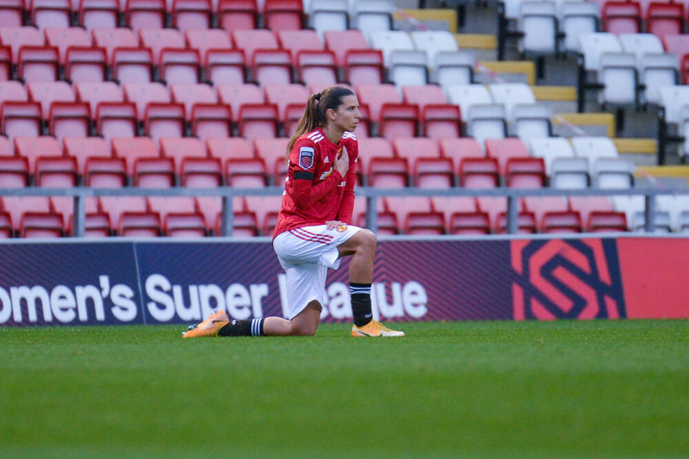 Tobin Heath's jawline; a thread