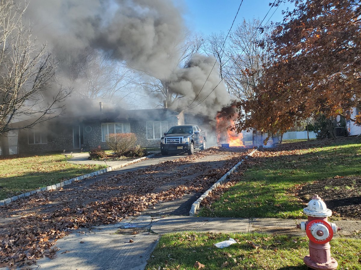 SoBrunswickPD's tweet photo. Multiple fire departments working at house fire on Richford Road in Kendall Park section of the Township. No injuries but home heavily damaged. https://t.co/61DRFMTQSe