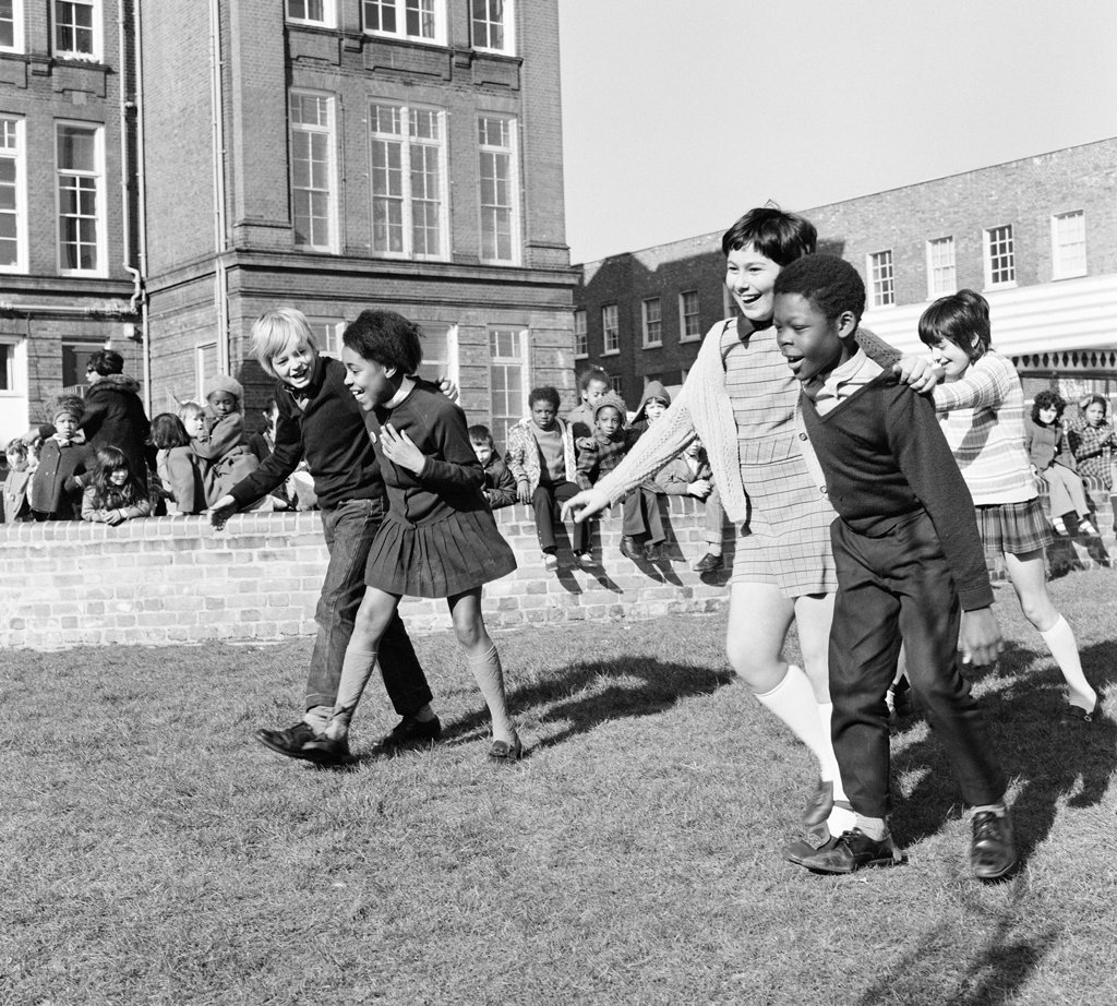 No one is born racist .A 3-legged race at Penton junior school, Islington, North London, 1971. Another H/T to  @GraemeRMcNay