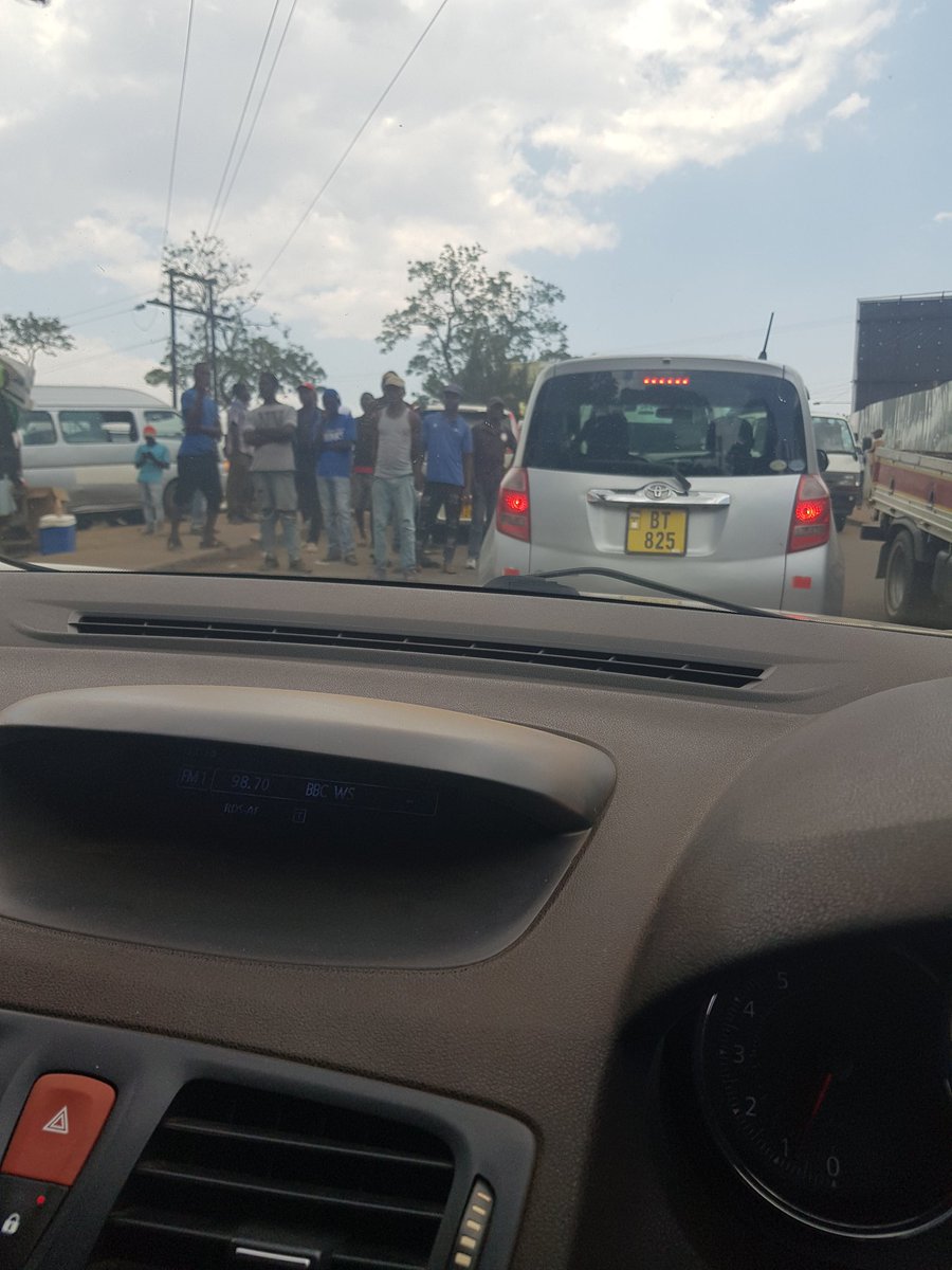Call boys at Limbe Bus terminal waiting for minibuses to patronize