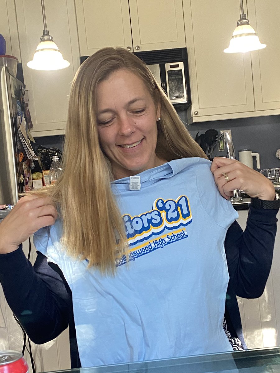 fionabase's tweet photo. shirt doesn’t fit me bc i am too husky RIP so here is my mom holding it up instead lolz  #SpiritWeek #classtshirtday #collsspirit https://t.co/y7iQbvRdGJ