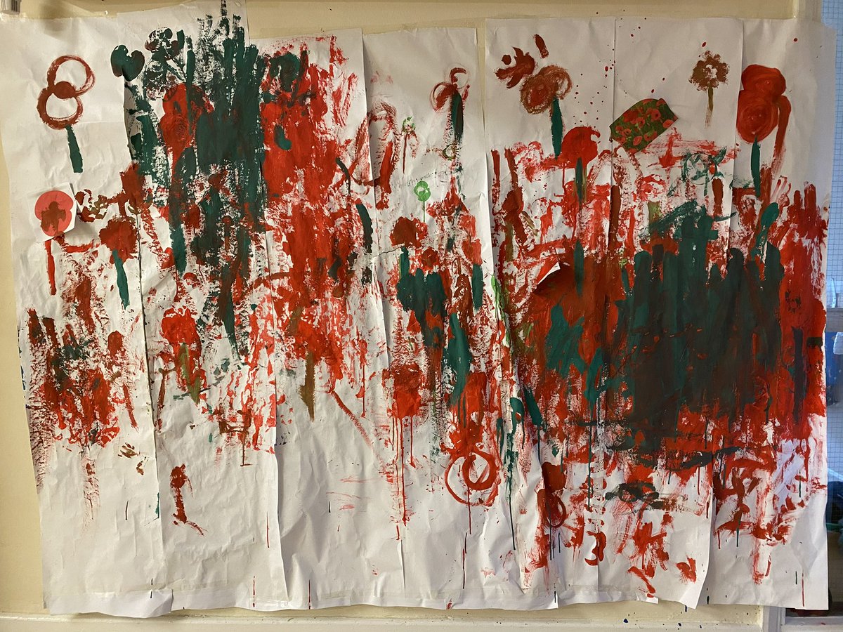 Remembrance Day Poppy Painting by our talented toddlers
