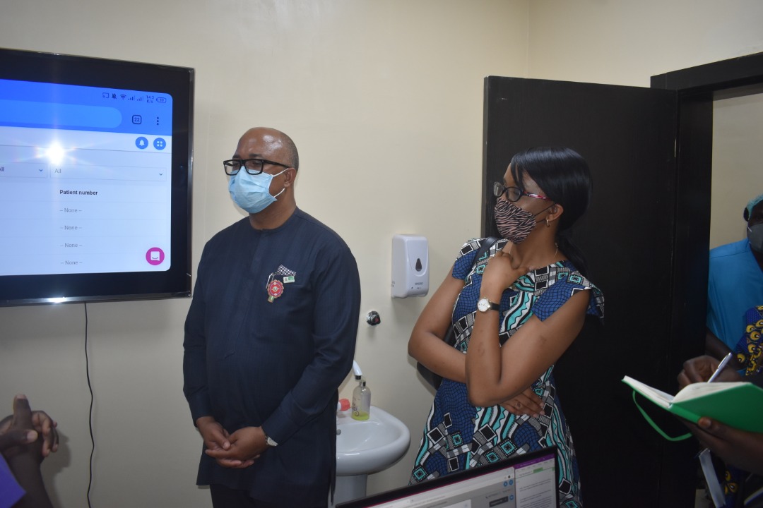 PharmAccessNIG's tweet photo. @NCDCgov DG @Chikwe_I visits @fmceblagos @covid_connectng center. An innovative digital service #LUSCII developed by @PharmAccessNIG in collaboration with @fmceblagos.The digital service screens users for #COVID19 symptoms and allows daily monitoring of symptoms via the app. https://t.co/Hf4lcxCBrY