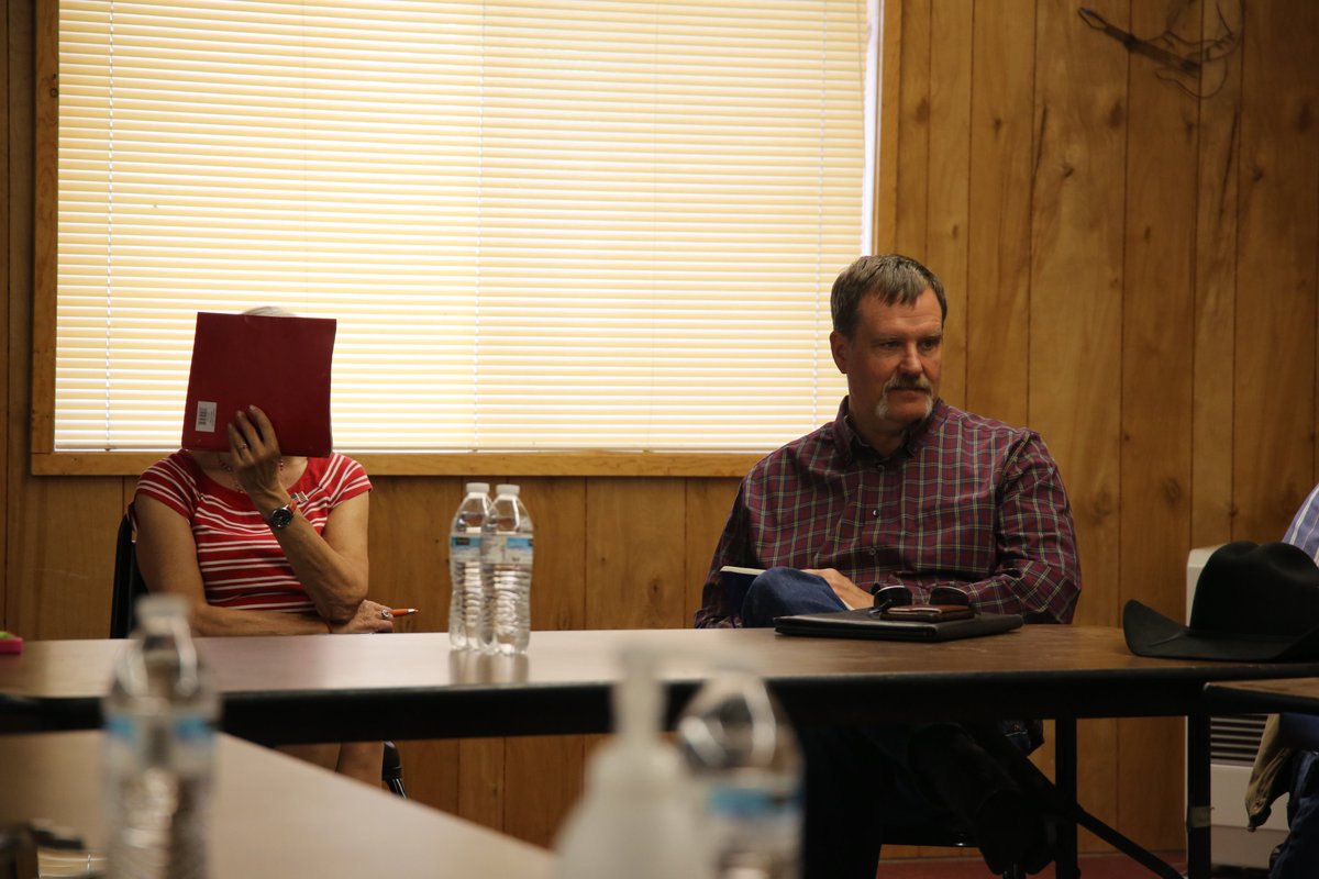 9 of the electeds who went to Prairie City are now part of the broad rural coalition asking Brown to meet and “consider a more realistic approach.”DeBone (pictured in June with Jefferson Co.'s Mae Hutson) said he now supports a mask mandate. 13/17