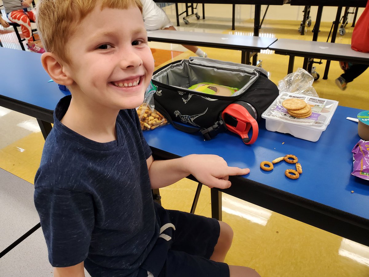 erinipock's tweet photo. I'm so thankful for the resilience and natural joy of kids! Lunch duty always reminds me of that! Today one friend used his lunch to build number bonds while another friend realized that her pizza was like the moon. @POEKPOE #Gratitude #OurStory https://t.co/6c8wT4h3SL