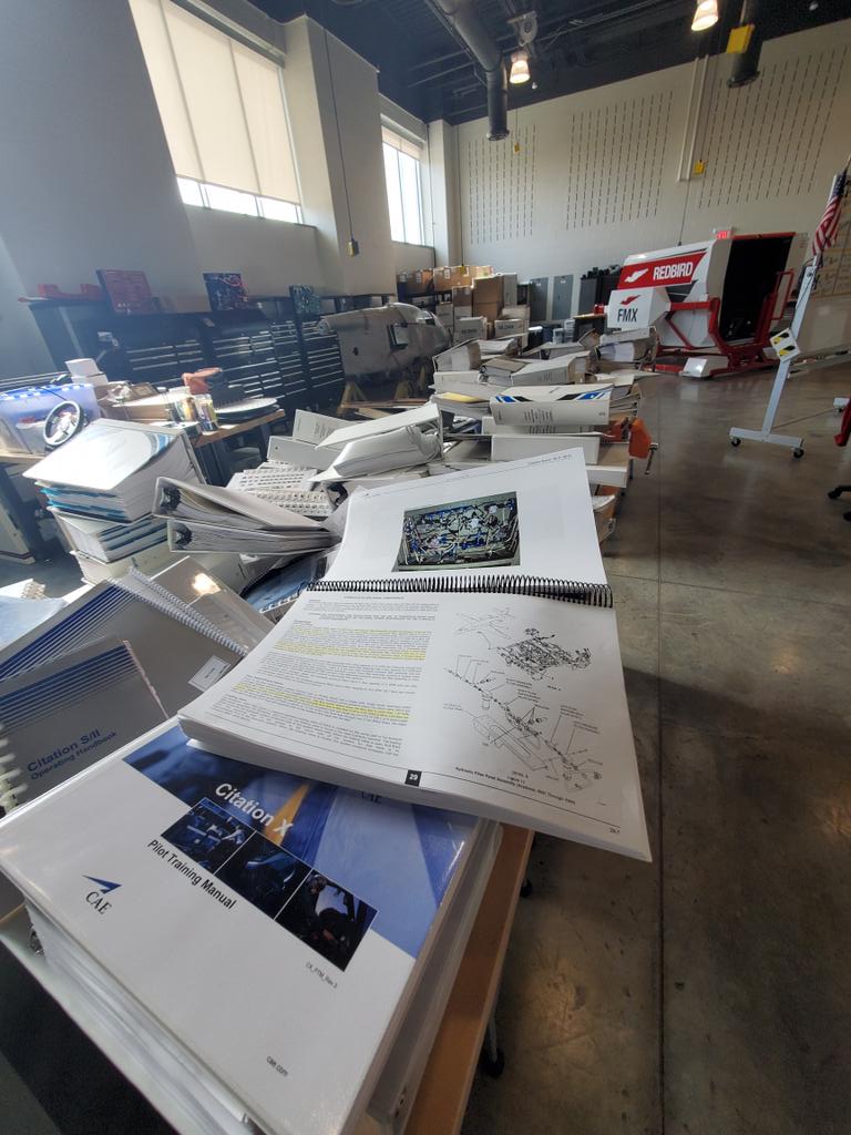 RachelEasterli4's tweet photo. @IrvingAviation so thankful to AIM for the donation of all of these flight manuals and training aids. It feels like Christmas here https://t.co/dpvhLnHFf3