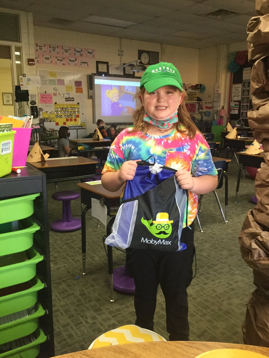This cutie is sporting some new Moby Max gear she purchased at our class auction today! #mobymax
