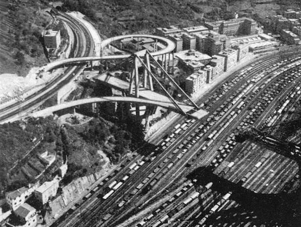 13/ But with the opening in the 1930s of the "Camionale", a toll, limited access modern road for trucks, the freight rail started to suffer from growing competition, growing in the post-WWII years with the massive freeway construction around Genoa.