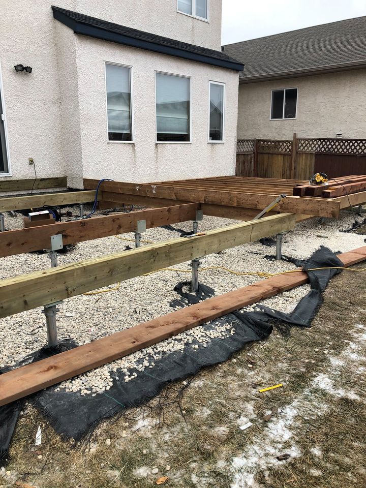 deck_city's tweet photo. Yes, we are still building this late in the season! We just started in the anchors for this deck project. We are already booking for next spring so give us a call to start your dream backyard. Call (204) 272-0610 to book a consult! https://t.co/LYnLexp0m1