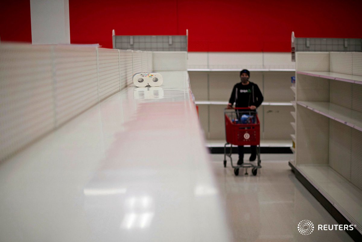 corinne_perkins's tweet photo. A lone package of paper towels remains on bare shelves due to the COVID-19 pandemic at a Target store in King of Prussia, Pennsylvania. Photo by @mark_makela https://t.co/VLMmBmbFJr