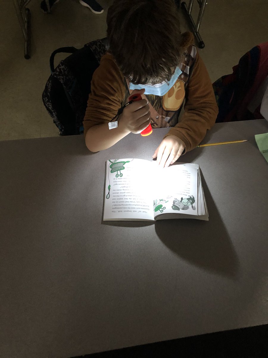emhollycross's tweet photo. We enjoyed some flashlight reading in our pjs today! #FMTFalconLife https://t.co/rAbzPYhWcv