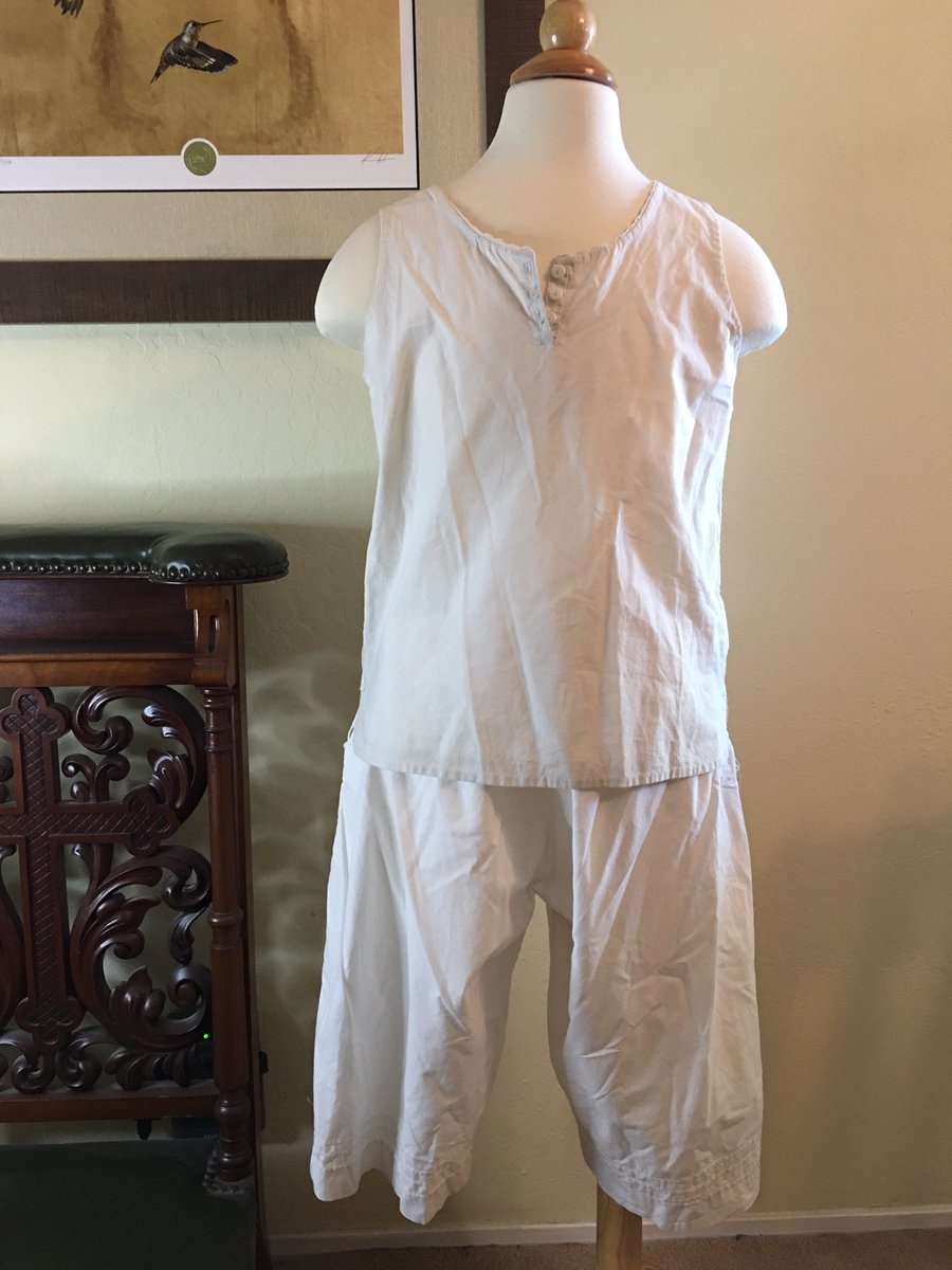 They became the bride of adventure going to unknown places for two damn weeks. But now they’re here! This little gray dress could be from season 1 or 2. It came with undershirt and bloomers. And has hand stitched details y’all. It fluffs out on its own which is adorbs. +