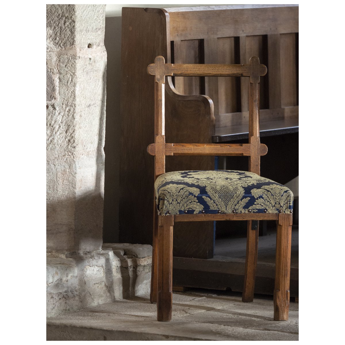 A glimpse of Roland W. Paul's stalls (& a pleasing little chair from an earlier date?). We have no info on maker(s), so if anyone has any, please tweet!