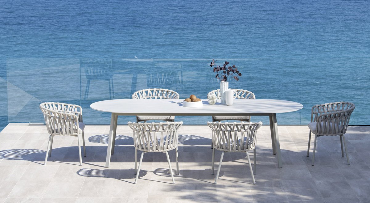 Emma Cross armchair inspired by the corolla of a flower. This iconic, elegant, fresh and stylish outdoor armchair is perfect for both residential and contract spaces. Also sutable for marine areas.