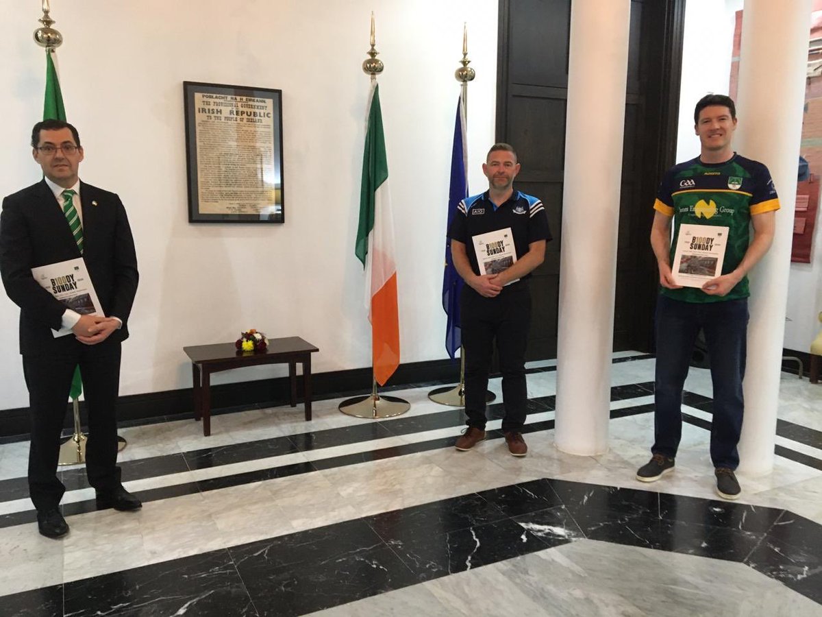 IrishEmbRiyadh's tweet photo. Amb McCoy and Alan Ralph met with Naomh Alee club member Iain Synnott today to mark the 100 anniversary of Bloody Sunday. Iain’s grandfather Joseph and grand uncles John and Stephen, played on the Dublin team on 21 November, 1920. https://t.co/ZqOuWpQYON