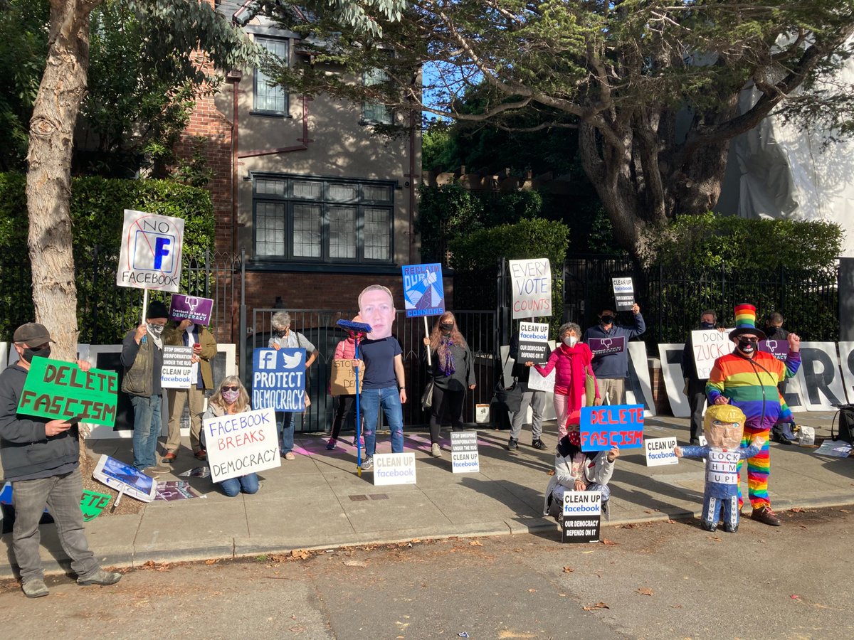 Eko_Movement's tweet photo. Today we gathered outside Zuckerberg's home in San Francisco to demand he cleans up Facebook! The platform's toxic algorithms push people to the most extreme content - littered w/ disinformation & lies. Let's tell Facebook to clean up its act: https://t.co/f5JOI5INKg #StopDisinfo https://t.co/WUJ5x6145N