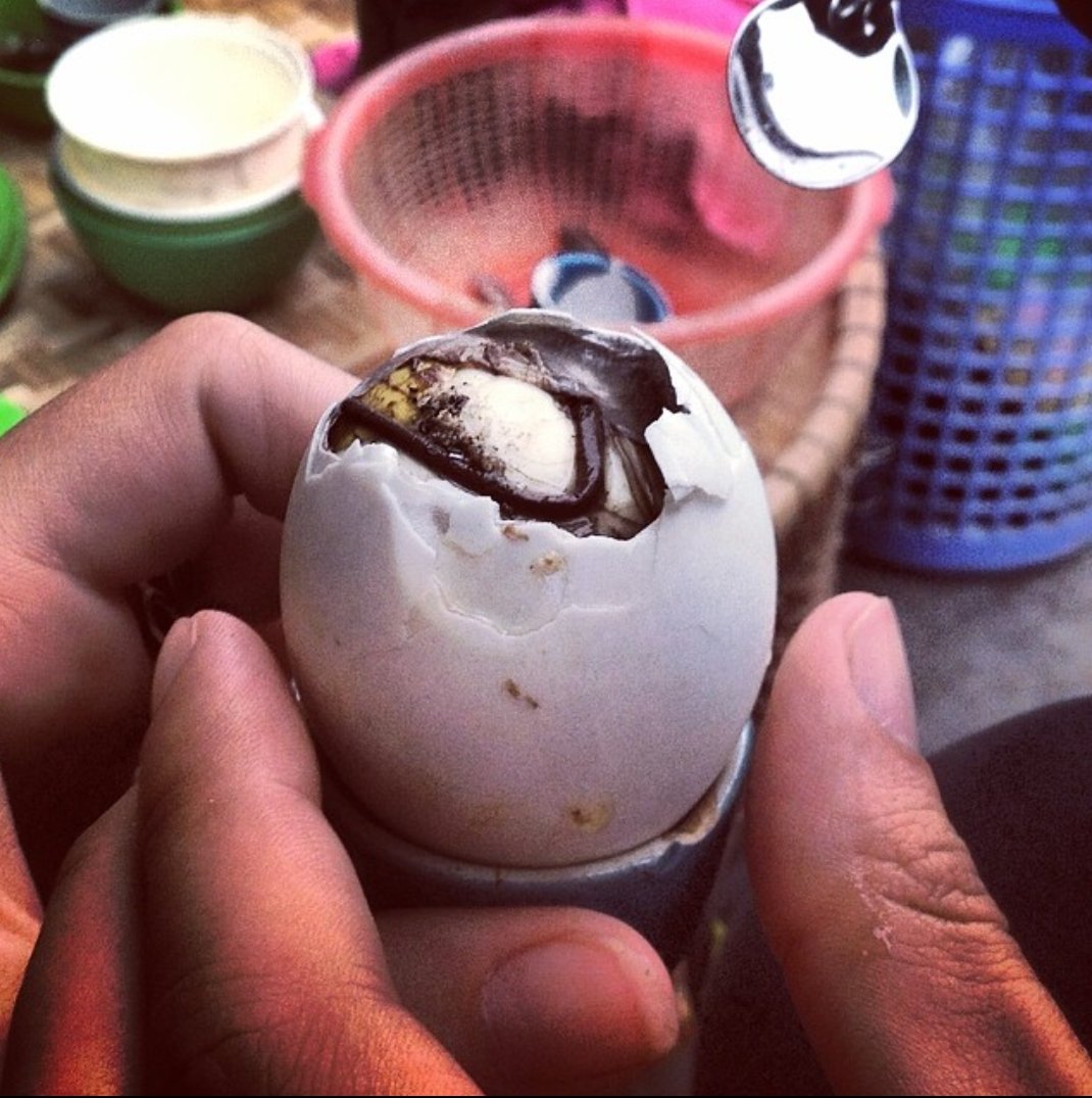 edwardcjp's tweet photo. @covid_comedy Hột Vịt Lộn - fertilized hard boiled duck eggs in vietnam! You crack it open and drink the salty 'soup' off the top before digging in https://t.co/ZG1EqGH2AF
